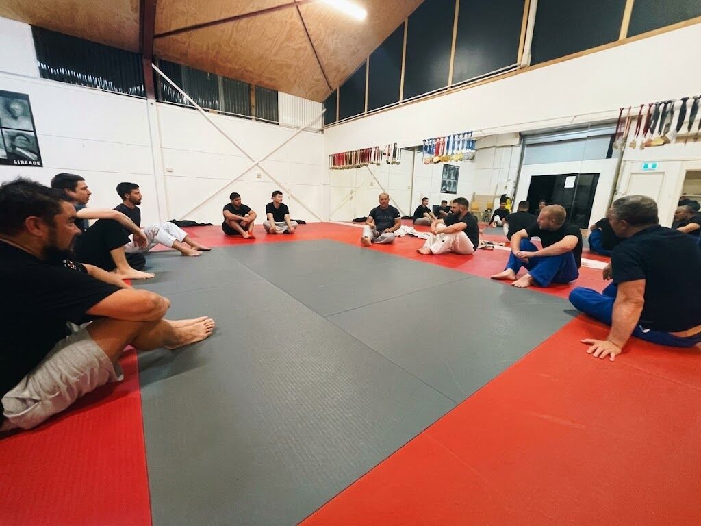 A class in session on the mats